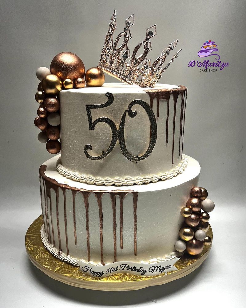 White and gold 50th birthday crown cake